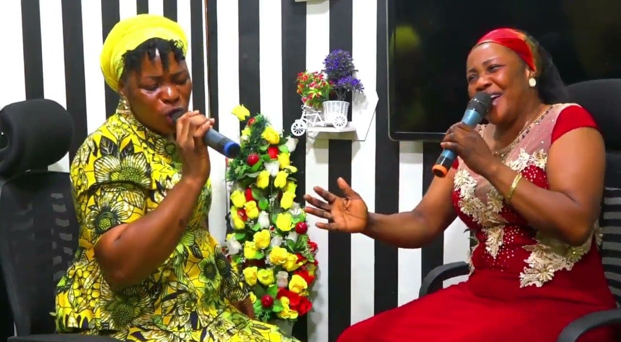 Two gospel singers performing a duet in the Crown studio
